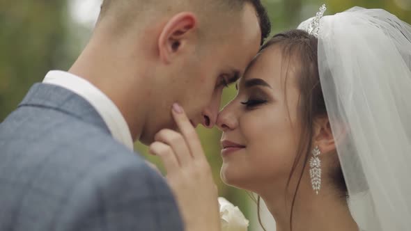 Caucasian Groom with Bride in the Park, Wedding Couple, Happy Family, Newlyweds