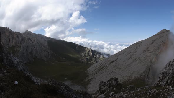 Time Lapse of Clouds Over Mountain Tops