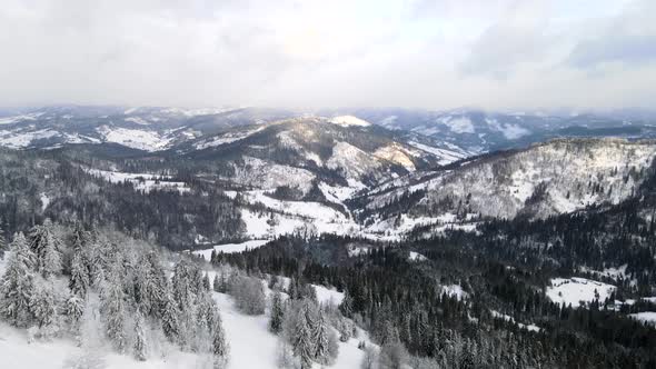 Aerial View of Sunrise Above Winter Carpathian Mountains