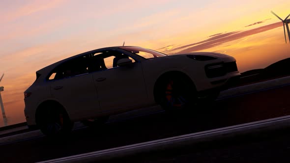 White Sports SUV and Wind Turbines