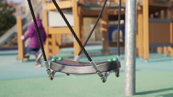 Closeup View of a Rope Swing in an Outdoor Playground