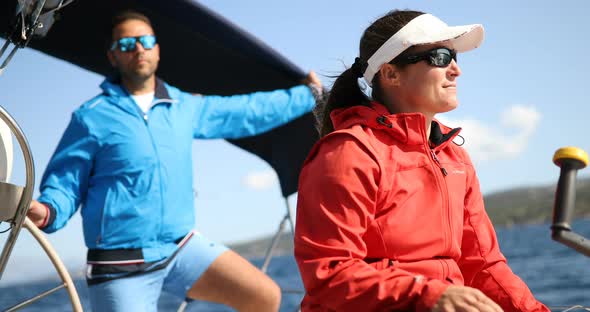 Couple Sailing in Sea at Sunny Day