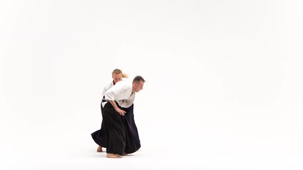 Two Males Showing Aikido Using Tanto