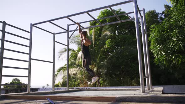 Athletic Man Working Out at an Outdoor Gym. Strength and Motivation.