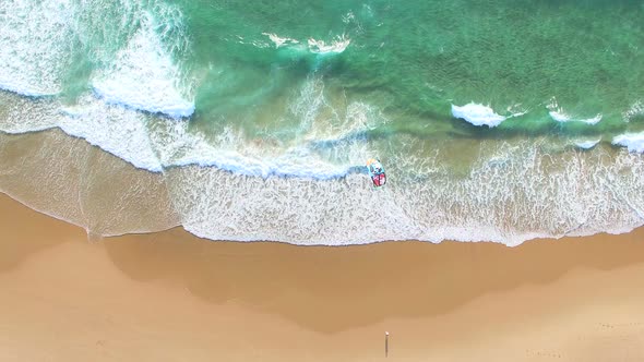 PRAIA DA GUINCHO BEACH, PORTUGAL - MAY 23, 2017: People kitesurfing at popular blue flag Guincho bea