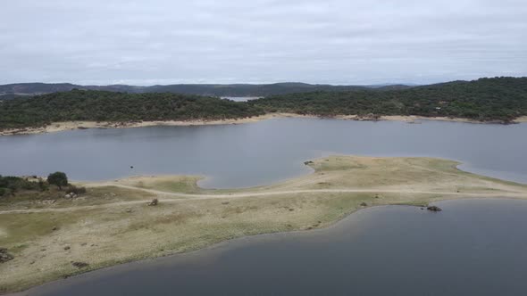 Drone aerial view of Idanha Dam Marechal Carmona landscape with beautiful blue lake water, in Portug