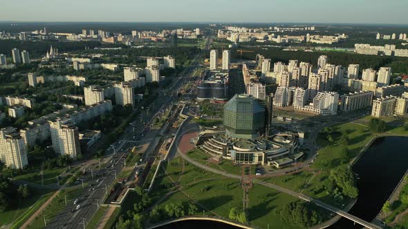 Top View of the National Library and a New Neighborhood with a Park in Minsk at sunset. Belarus