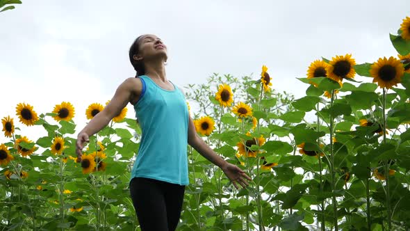 Beautiful woman raising hand in the air. Freedom Happy Time.