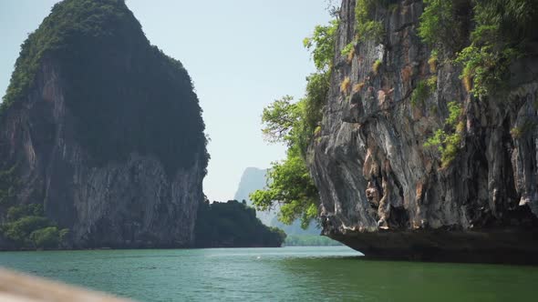 Serene Shot of Ocean Mountainside Clifs Trees and Sky  Khao Lak Thailand