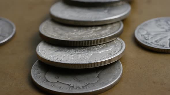 Rotating stock footage shot of antique American coins - MONEY 0119