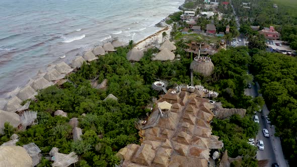 Beautiful Aerial View of the Eco Wooden Houses in the Middle of a Jungle