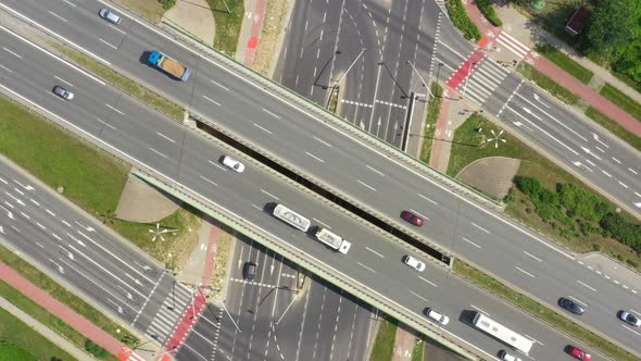 Top view over the highway, expressway and motorway, Aerial view interchange with car driving down th