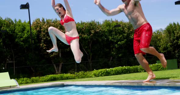 Family enjoying in swimming pool