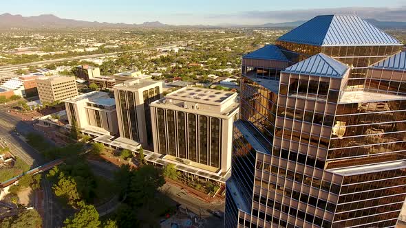 Cinematic rotating drone shot of downtown Tucson Arizona and surrounding city buildings