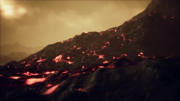Volcanic Eruption with Fresh Hot Lava Flames and Gases Going Out From the Crater