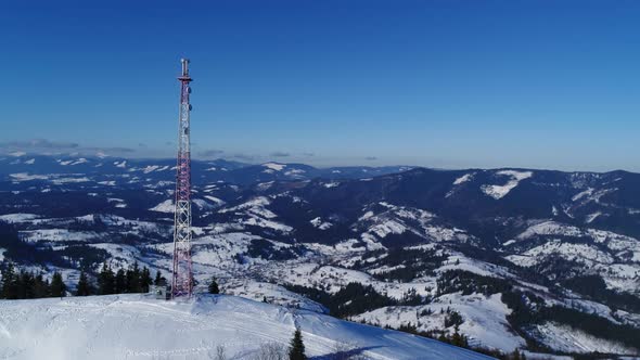 Flying Over Radio Communications Tower, Mounta Snow Covered Winter Landscape