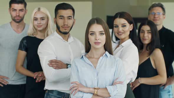 Team of Creative People Looking at the Camera