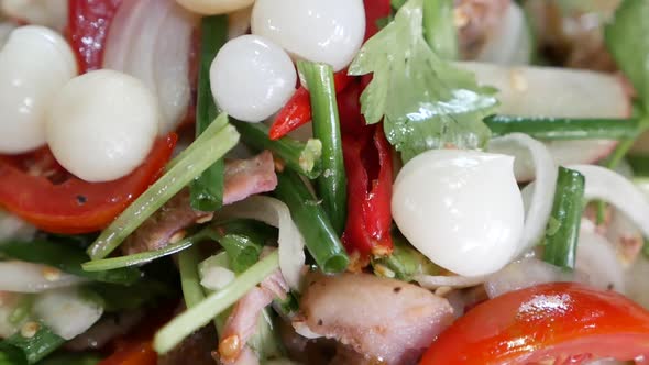 Close Up Footage of Thai Style Hot and Sour Grilled Beef Salad With Herbs and Garlic Pickle