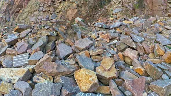 A Large Number of Boulders Lie in Huge Heaps on Dry Terrain