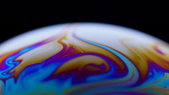 Colorful Close Up Surface of a Soap Bubble with Abstract Psychedelic Background and Patterns on