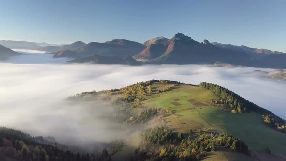 Aerial Morning above Foggy Landscape Nature in Autumn with Beautiful Golden Colors