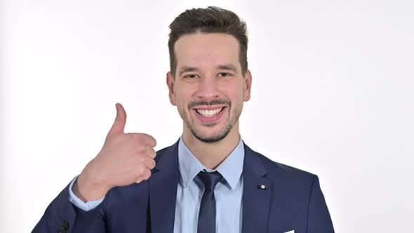 Portrait of Cheerful Young Businessman Showing Thumbs Up, White Background