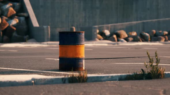 Old and Rusty Metal Barrel on Parking