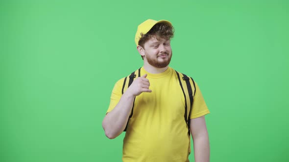 Portrait of Young Men Making Gesture Call Me Pointing Finger at Someone