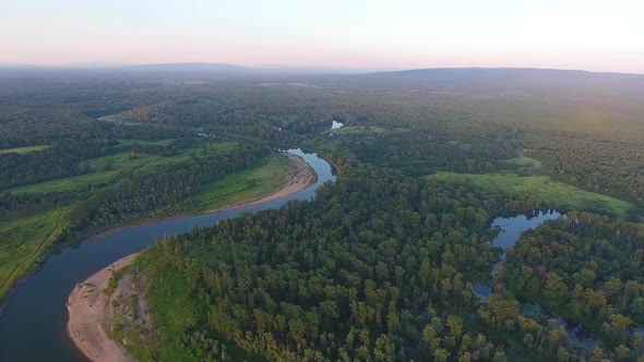 Aerial Landscape with Small River at Sunset