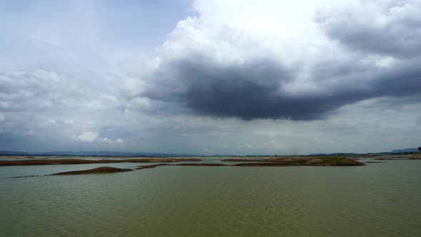 panning shot of less water in Pasak Jolasid Dam at Lopburi, Thailand (drought concept)