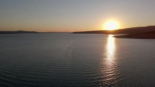 Sunset and Boat on the Sea