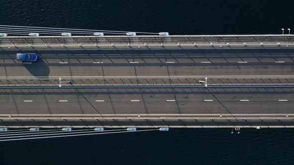 Vehicles Crossing a Suspension Cable Stayed Bridge in Slow Motion