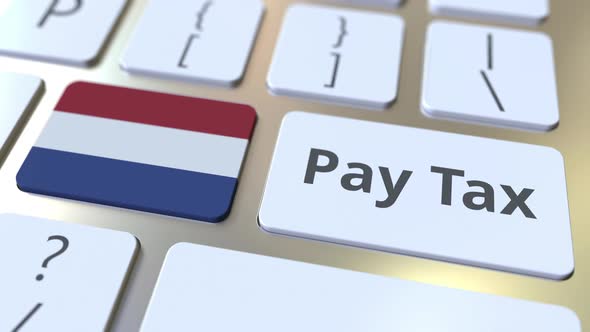 PAY TAX Text and Flag of the Netherlands on the Keyboard