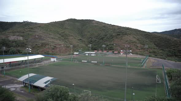 Far away soccer field in the mountains