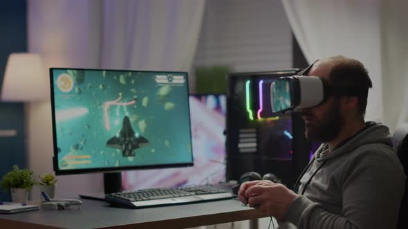 Pro Cyber Sport Gamer Wining Playing Video Games Using Vr Headset