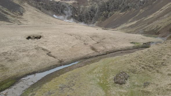 Drone flying towards fumaroles at Reykjadalur in Iceland, Aerial