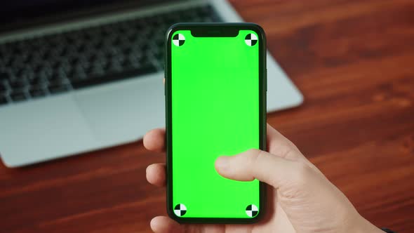 Businessman Using Smartphone with Chroma Key Closeup