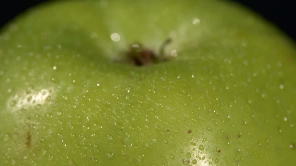 Top of Wet Green Apple Isolated on Black, Rotation Close Up