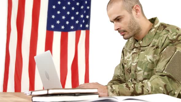 Soldier using laptop