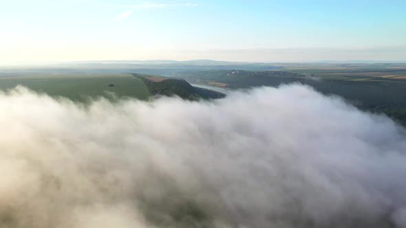 Awesome top view of the misty morning rural scene.