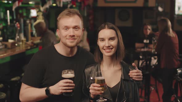 Happy Young Couple At Bar