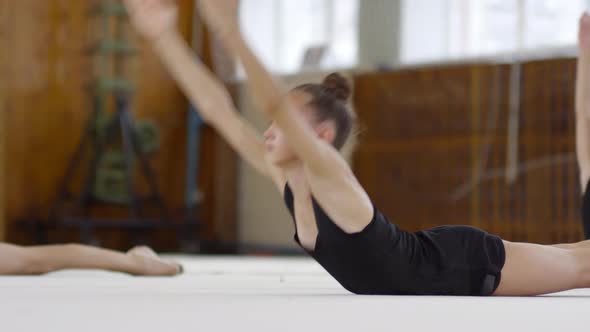 Teenage Girls Performing Energetic Exercises