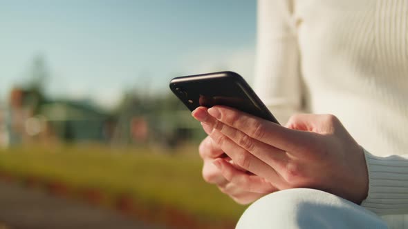 Woman Using Smartphone Outdoor