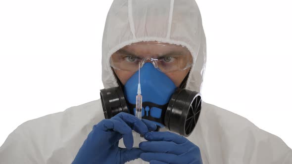 Medical Research, Coronavirus Vaccine A Man in a Protective Suit, in a Mask and a Respirator