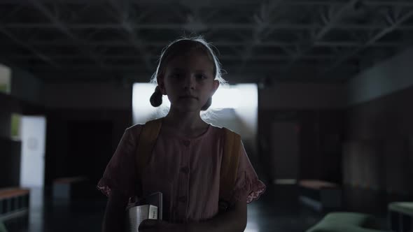 Schoolgirl Walking Dark Hallway Alone