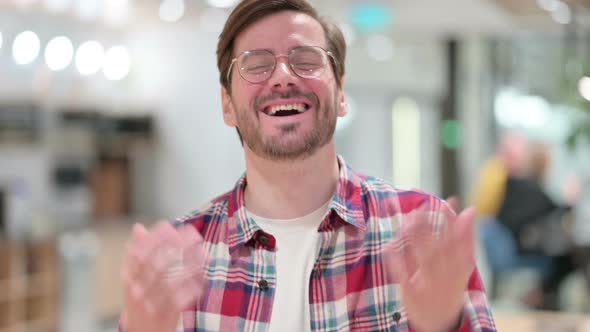 Portrait of Attractive Male Designer Doing Video Chat