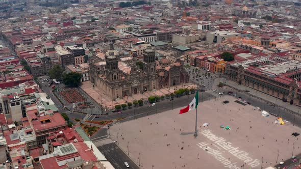 Forwards Fly Over Plaza De La Constitucion with Large State Flag