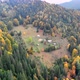 Aerial Shot Of Small Village of Dzembronia on Hill in Carpathians - VideoHive Item for Sale