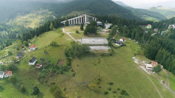 Abandoned Hotel On Zlatar Mountain Peak Serbia Forest And Fields Around Camera Approaching