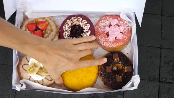 Top View of Vegan Donuts with Different Frostings and Fillings